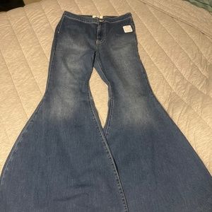 Free people bell bottom blue jeans